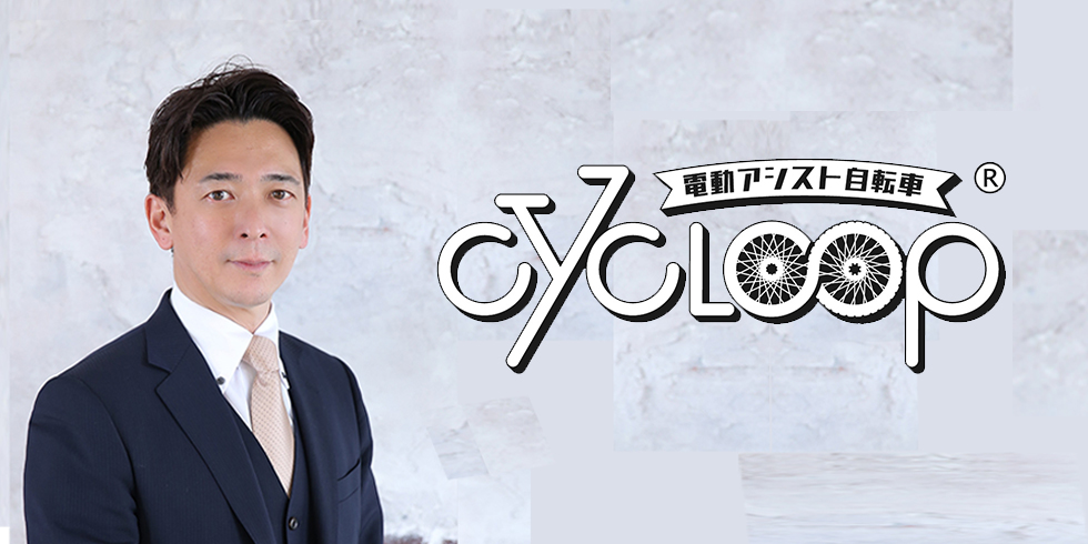 Canonのロゴが表示されたオフィスの前で立つ2人の男性